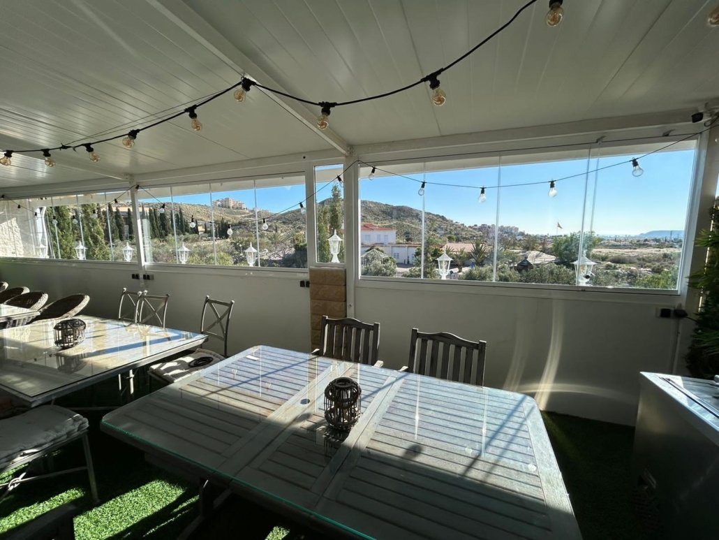 Cerramiento aluminio y cristal Malaga restaurante Cortinas de cristal Malaga restaurante